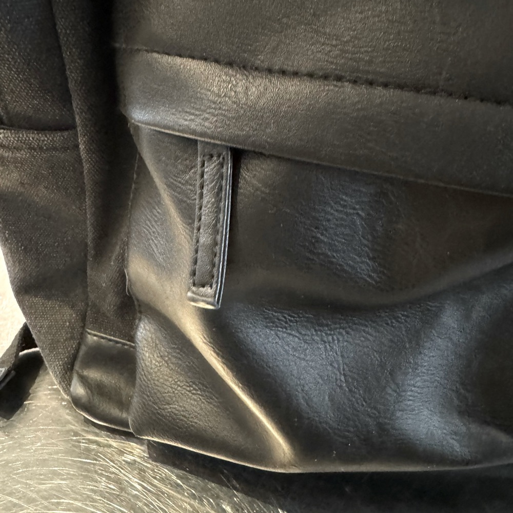 Black denim/leather backpack